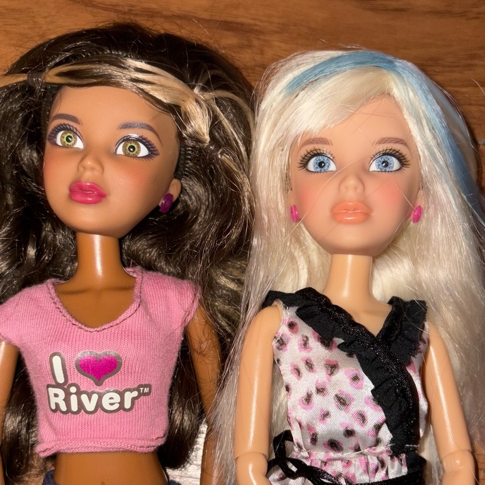 Pair of Fashion Dolls with Pink Accents